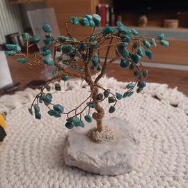 Albero della vita in ferro e turchese su pietra