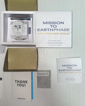 omegaxswatch mission to earthphase moonshine gold