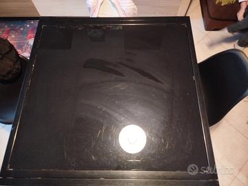 tavolo nero con piano il vetro 