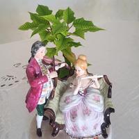 Statua di porcellana/coppia in peltro