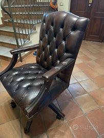 poltrona girevole in pelle