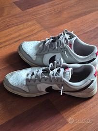 Nike dunk low bianche grigie e nere