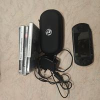 PSP + giochi + caricatore 