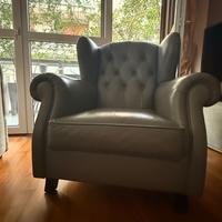 Poltrona in vera pelle grigia