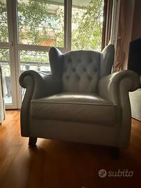 Poltrona in vera pelle grigia