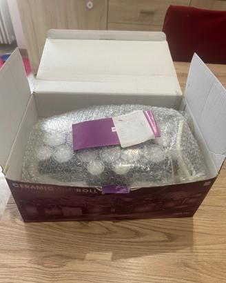 Scalda bigodini elettrico