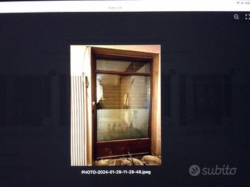 Serramento in PVC effetto legno noce medio