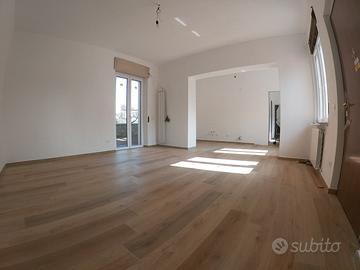 Trilocale con 2 bagni, box e giardino privato