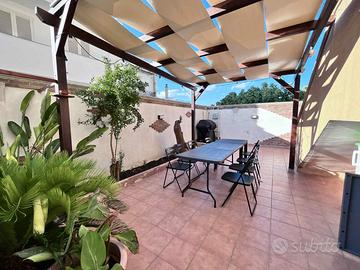 Recente piano rialzato con giardino e box