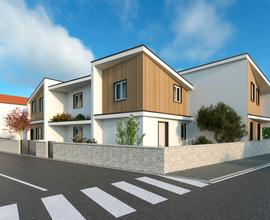 Villetta a schiera con veranda coperta