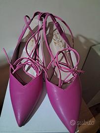 Décolleté fucsia completamente in pelle.