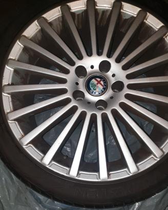 4 cerchi in lega R18 montati su Alfa 166