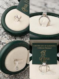Anello solitario oro bianco 18kt e diamante 0,14