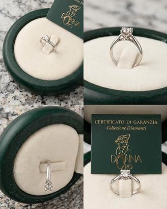 Anello solitario oro bianco 18kt e diamante 0,14