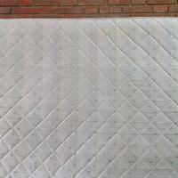 materasso matrimoniale e doghe in legno