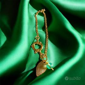 Bracciale dorato con doppio charm