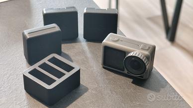 DJI OSMO ACTION 4K + 3 batterie originali con base