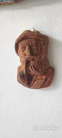 piccola scultura in legno intagliato 