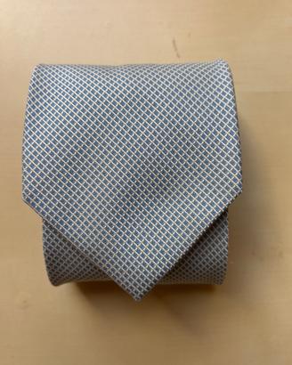 Cravatta verde chiaro con geometrie a rombi