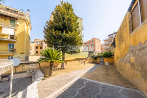 TRILOCALE CON GIARDINO DI 160 MQ