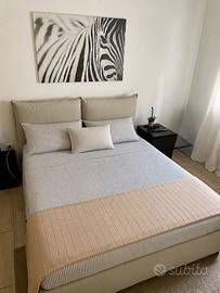 Letto con contenitore e cassettiera