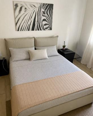 Letto con contenitore e cassettiera
