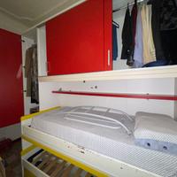 Armadio a ponte con cabina e letto