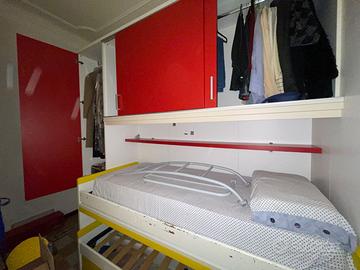 Armadio a ponte con cabina e letto