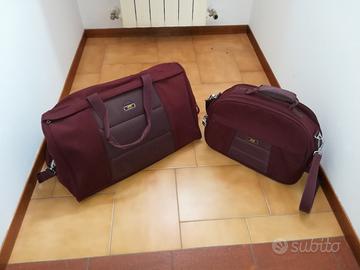 Borsone e beauty-case color amaranto