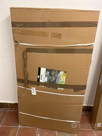 Sdraio con ombrellone e cuscino