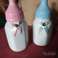 Due salvadanai biberon