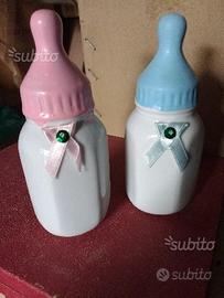 Due salvadanai biberon