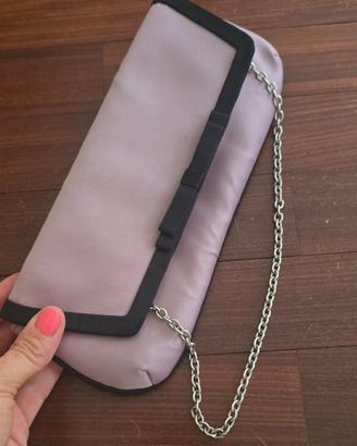 Pochette elegante lilla con fiocco nero 