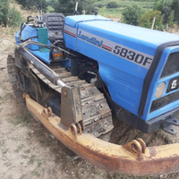 Trattore cingolato con apripista