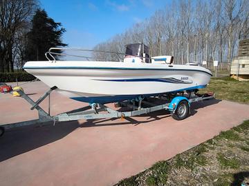 barca Ranieri azzurra motorizzata evinrude etec 40