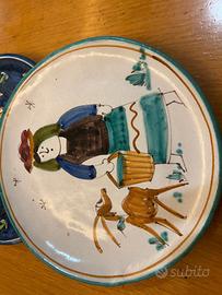 piatto da parete in ceramica dipinto a mano