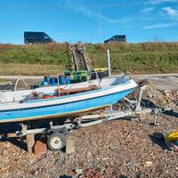 Barca, arrello e motore