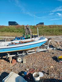 Barca, arrello e motore