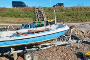 Barca, arrello e motore