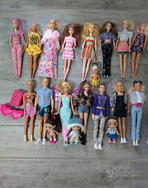Barbie + accessori + auto e scooter + vestiti