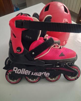 Pattini in linea e casco 