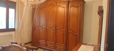 Camera matrimoniale completa in legno massello