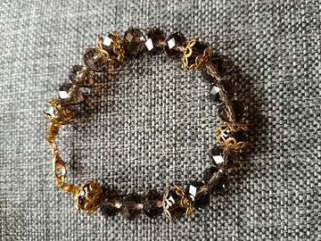 bracciale ambra con dettagli dorati perle di vetro