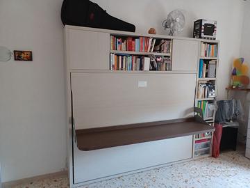 Mobile letto a scomparsa Molteni con Libreria