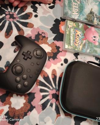 Switch 2 con scatola, giochi, joystick custodia