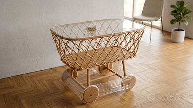 Culla stile vintage in vimini con ruote in legno