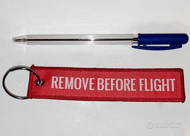 Portachiavi Keychain Remove before flight rosso