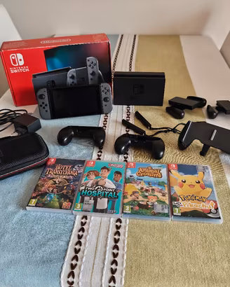 Nintendo Switch V2 + accessori + 2 giochi