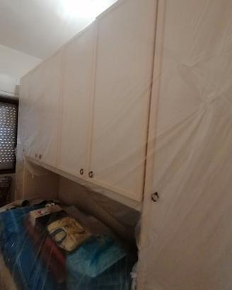 Armadio a ponte con letto