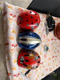 Seggiolino bici + caschetti bici